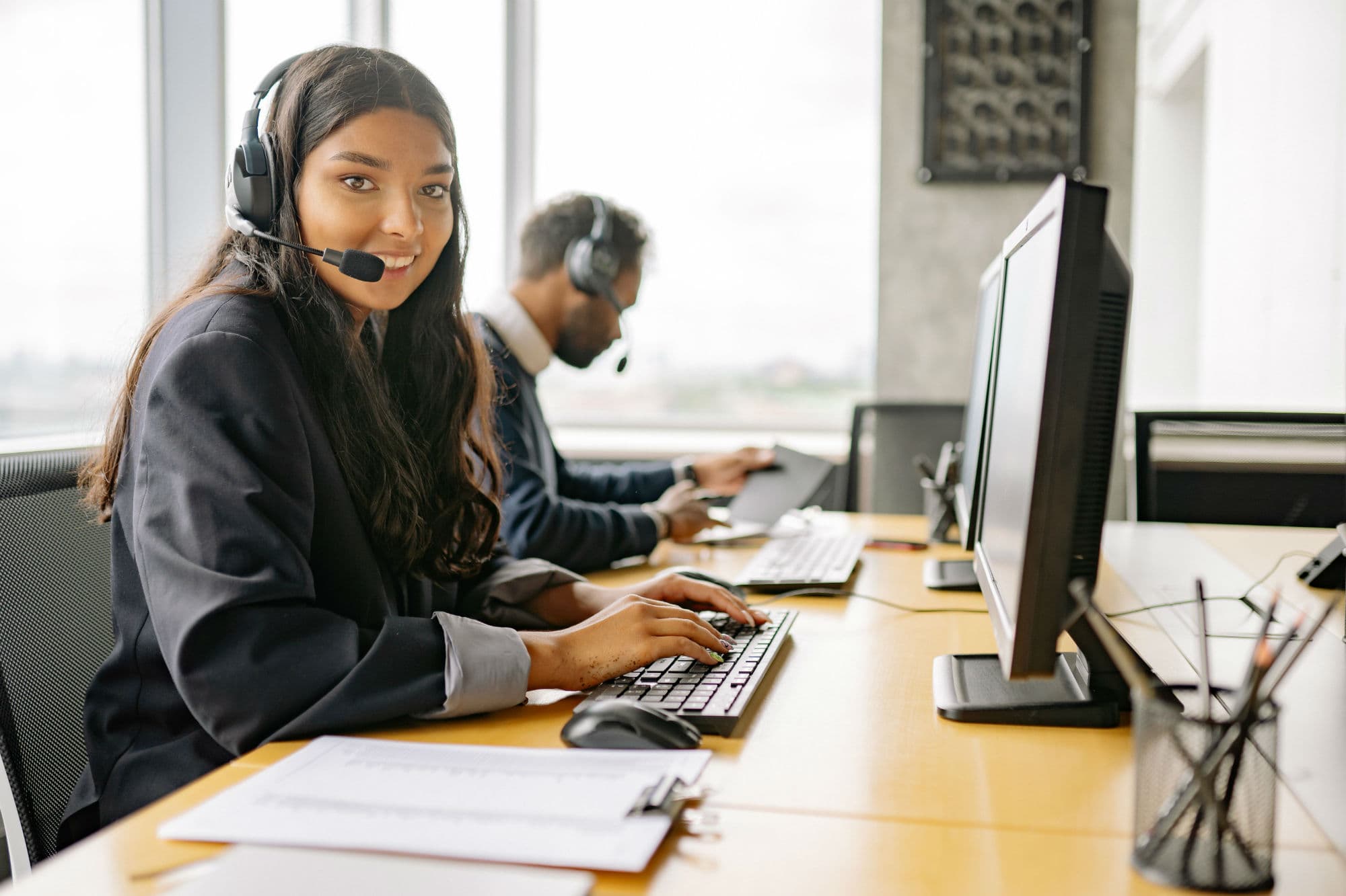 Customer support team working with headsets